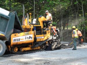 Drain Bros. Paving a Tennis Court