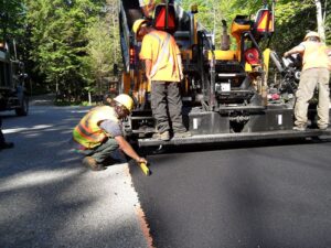 Drain Bros. Paving a Tennis Court