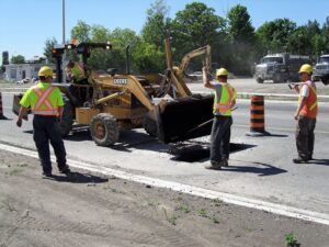 Drain Bros. patching Landsdowne Street in Peterborough