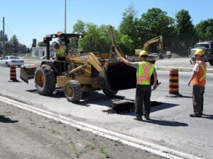 Drain Bros. patching Landsdowne Street in Peterborough