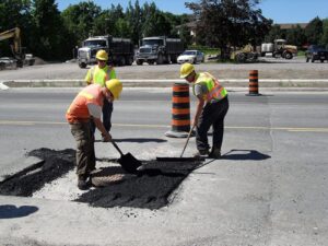 Drain Bros. patching Landsdowne Street in Peterborough